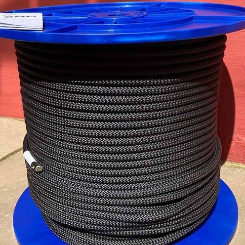 DMM Worksafe rope, black on a blue plastic reel