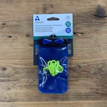 The Aquapac Keymaster in Blue. Wooden Background.